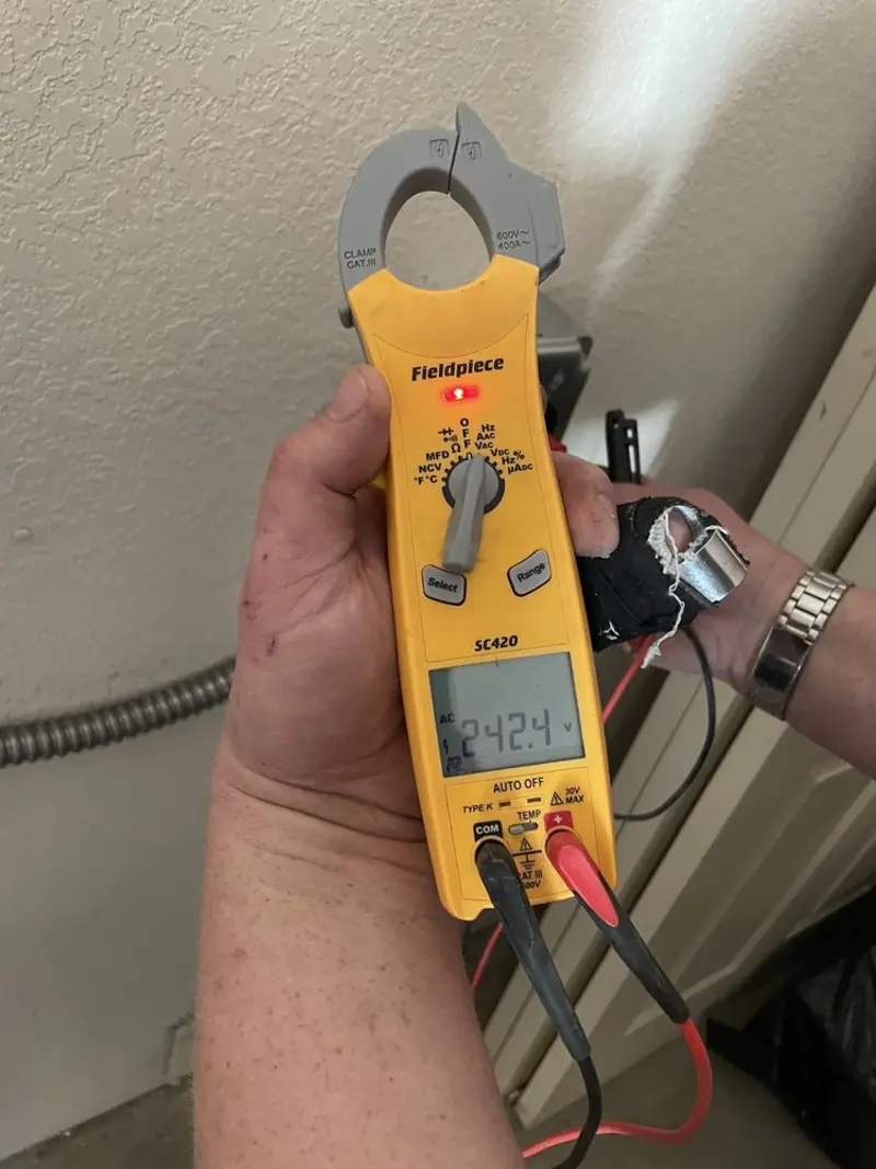 Voltage testing with clamp meter during Ceiling Fan Installation in Freemansburg